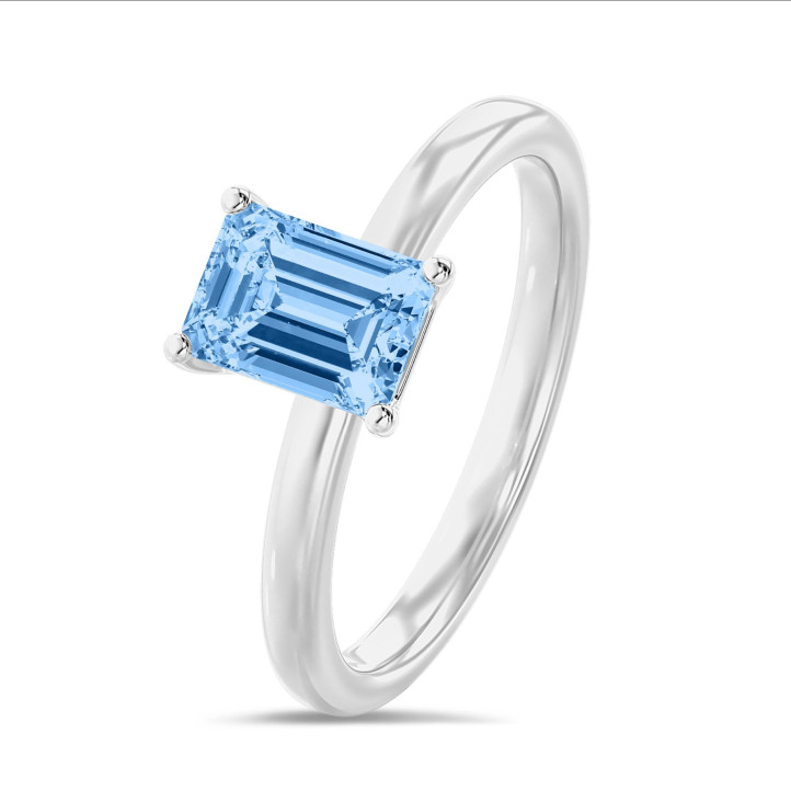 1.00 Karat Solitärring mit blauem Diamant im Smaragdschliff aus Weißgold