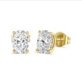 4.00 Karat Solitär Ohrringe aus Gelbgold mit ovalen Diamanten