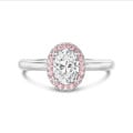 3.00 Karat Halo Solitärring mit ovalem Diamant aus Rotgold mit rosa runden Diamanten