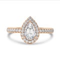 5.00 Karat Halo Solitärring aus Rotgold mit Tropfen-Diamant und runden Diamanten