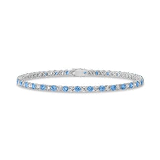 3.50 carat tennis bracelet in white gold with blue and white diamonds