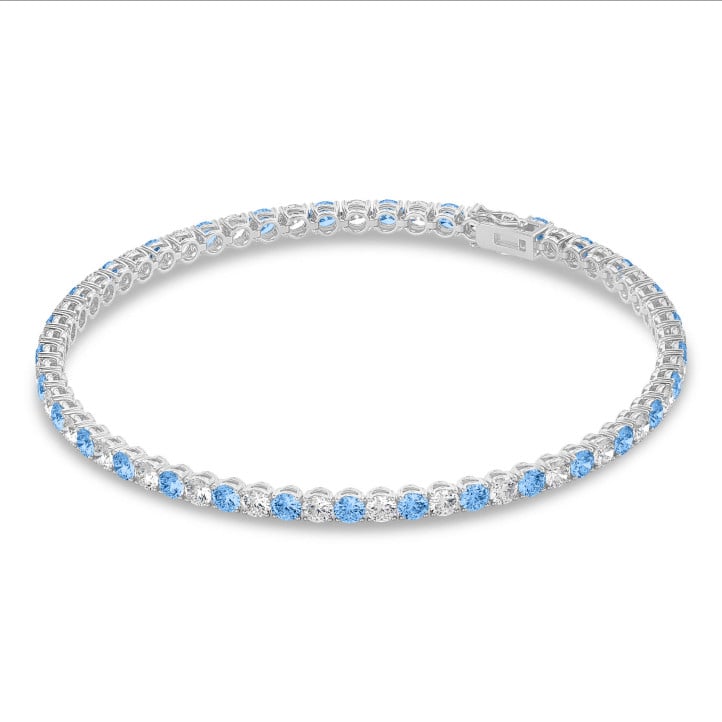 3.50 carat tennis bracelet in white gold with blue and white diamonds