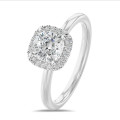 1.50 carat solitaire halo ring with a lab grown cushion diamond in white gold with round lab grown diamonds