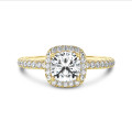 2.50 carat solitaire halo ring with a lab grown cushion diamond in yellow gold with round lab grown diamonds
