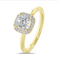 1.00 carat solitaire halo ring with a lab grown cushion diamond in yellow gold with round lab grown diamonds