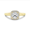 3.00 carat solitaire halo ring with a lab grown cushion diamond in yellow gold with round lab grown diamonds