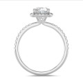 3.00 carat solitaire halo ring with a lab grown cushion diamond in white gold with round lab grown diamonds