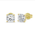 4.00 carat solitaire lab grown cushion cut diamond earrings in yellow gold