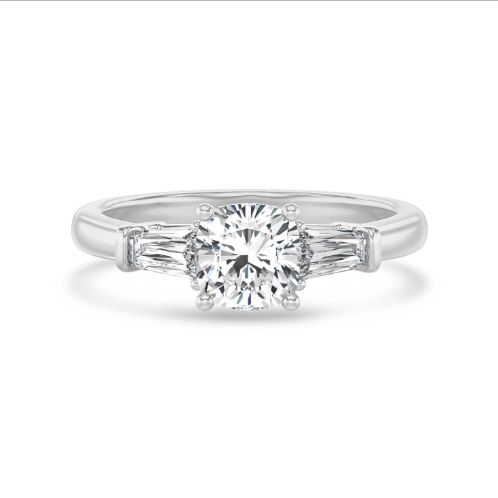 1.00 carat trilogy ring in white gold with a lab grown cushion diamond and lab grown tapered baguettes
