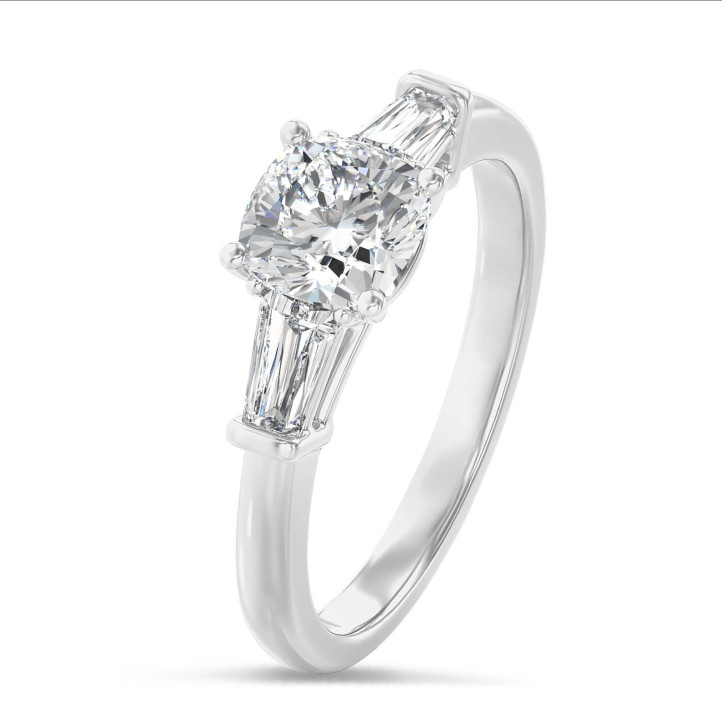 1.00 carat trilogy ring in platinum with a lab grown cushion diamond and lab grown tapered baguettes