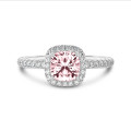 1.50 carat solitaire halo ring with a pink lab grown cushion diamond in white gold with round lab grown diamonds