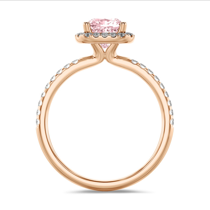 1.00 carat solitaire halo ring with a pink lab grown cushion diamond in red gold with round lab grown diamonds