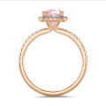 2.50 carat solitaire halo ring with a pink lab grown cushion diamond in red gold with round lab grown diamonds