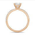 2.50 carat solitaire ring with a princess diamond in red gold with side diamonds