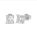 2.00 carat solitaire earrings in white gold with princess diamonds
