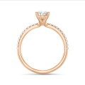 3.00 carat solitaire ring with lab grown pear diamond in red gold with lab grown side diamonds