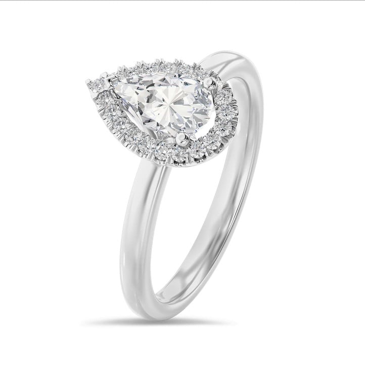 1.00 carat solitaire halo ring with pear diamond in white gold with round diamonds