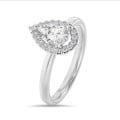 2.50 carat solitaire halo ring with lab grown pear diamond in white gold with round lab grown diamonds