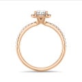 3.00 carat solitaire halo ring with pear diamond in red gold with round diamonds