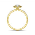 1.00 carat solitaire halo ring with pear diamond in yellow gold with round diamonds