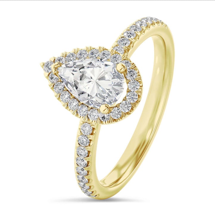 2.50 carat solitaire halo ring with lab grown pear diamond in yellow gold with round lab grown diamonds