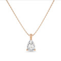 1.00 carat solitaire pear cut diamond pendant in red gold