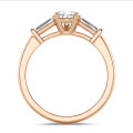 1.00 carat trilogy ring in red gold with lab grown pear diamond and lab grown tapered baguettes