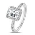1.00 carat solitaire halo ring with a emerald cut diamond in white gold with round diamonds