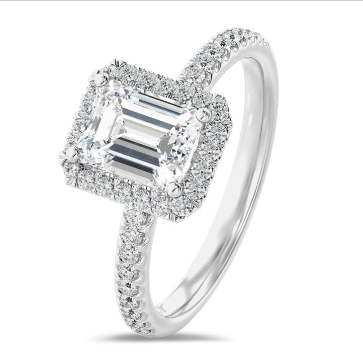 1.00 carat solitaire halo ring with a emerald cut diamond in white gold with round diamonds