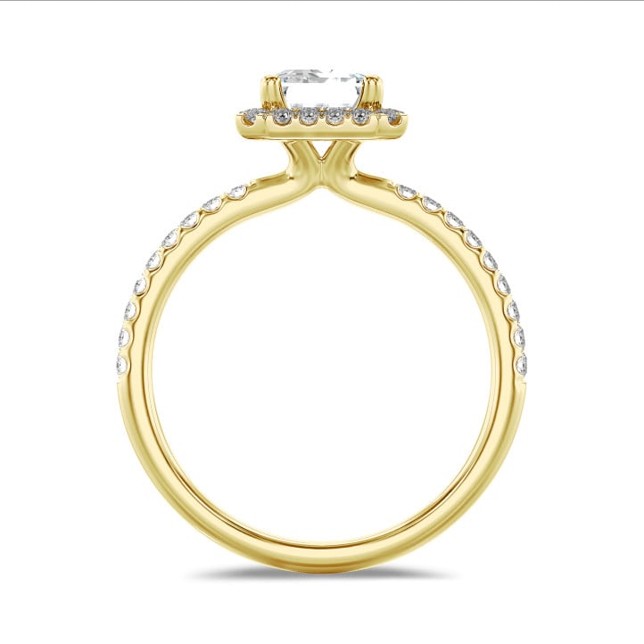 3.00 carat solitaire halo ring with a emerald cut diamond in yellow gold with round diamonds