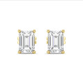 4.00 carat solitaire emerald cut diamond earrings in yellow gold