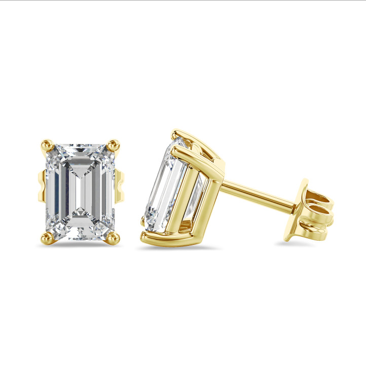 4.00 carat solitaire lab grown emerald cut diamond earrings in yellow gold