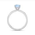 1.50 carat solitaire ring with a blue emerald cut diamond in white gold