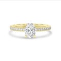 1.00 carat solitaire ring with oval diamond in yellow gold with side diamonds