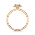 1.00 carat solitaire halo ring with lab grown oval diamond in red gold with round lab grown diamonds
