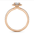 1.00 carat solitaire halo ring with oval diamond in red gold with round diamonds