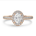 1.20 carat solitaire halo ring with lab grown oval diamond in red gold with round lab grown diamonds