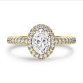 1.50 carat solitaire halo ring with oval diamond in yellow gold with round diamonds