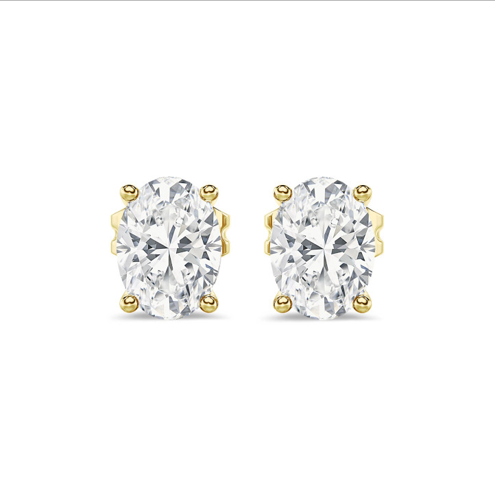 2.00 carat solitaire oval cut diamond earrings in yellow gold