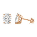 2.00 carat solitaire oval cut diamond earrings in red gold