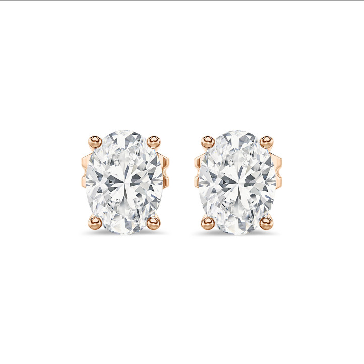 3.00 carat solitaire oval cut diamond earrings in red gold