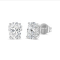 4.00 carat solitaire oval cut diamond earrings in white gold