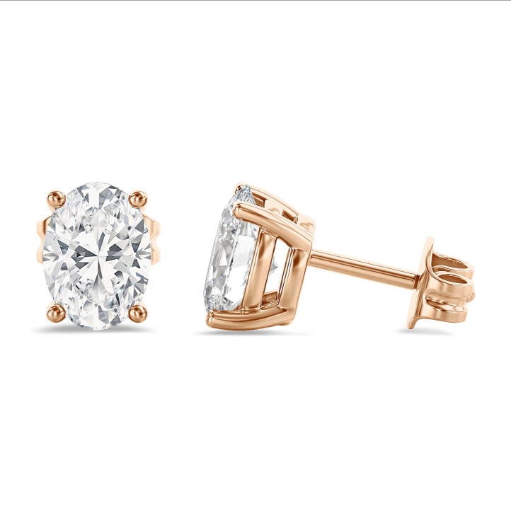 4.00 carat solitaire oval cut diamond earrings in red gold