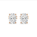 4.00 carat solitaire oval cut diamond earrings in red gold