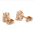 4.00 carat solitaire oval cut diamond earrings in red gold