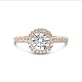 1.20 carat solitaire halo ring in red gold with round diamonds