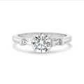 1.00 carat trilogy ring in platinum with round lab grown diamond and lab grown tapered baguettes