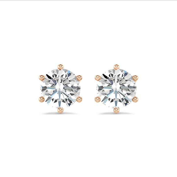 4.00 carat solitaire diamond earrings in red gold