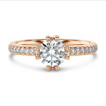 2.00 carat solitaire diamond ring in red gold with side diamonds