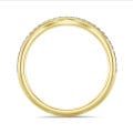 0.23 carat curved diamond eternity ring (half set) in yellow gold